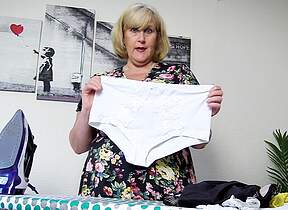 Horny stepmom in stockings ironing her